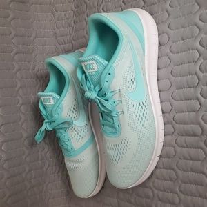 Nike mint green FREE RUN running shoe.